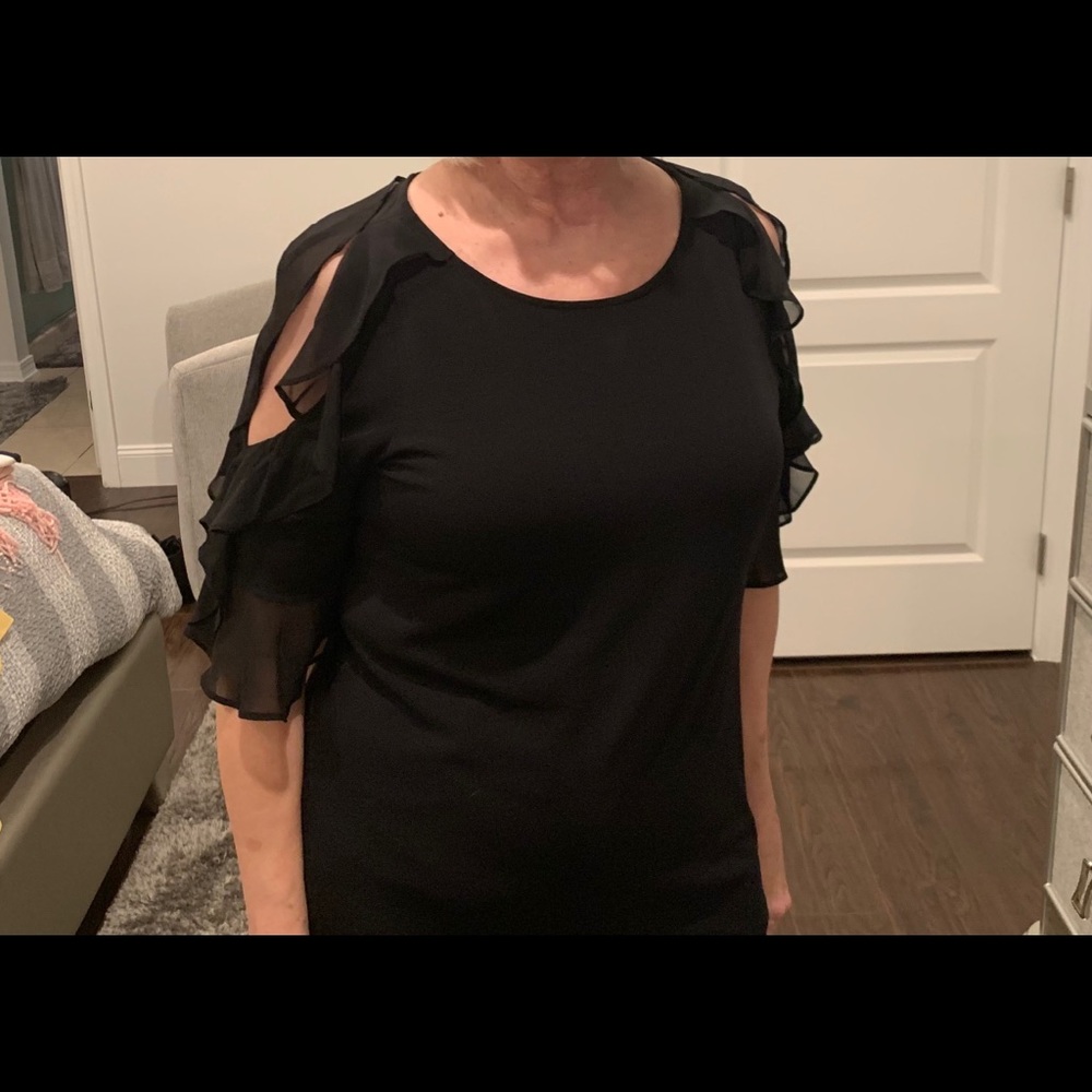 Women’s black top with open shoulder sleeves